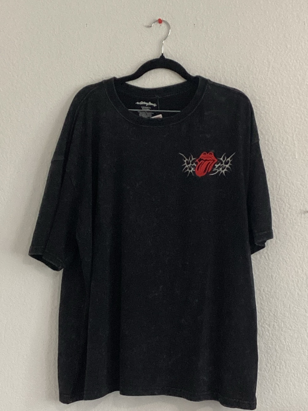 the Rolling Stones Black Short-Sleeve Tee with Red Tongue Patch